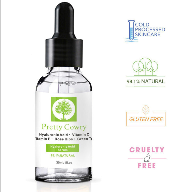 Pretty Cowry Vitamin C Serum bottle with natural ingredients label, promoting cruelty-free, gluten-free, and cold-processed skincare benefits.