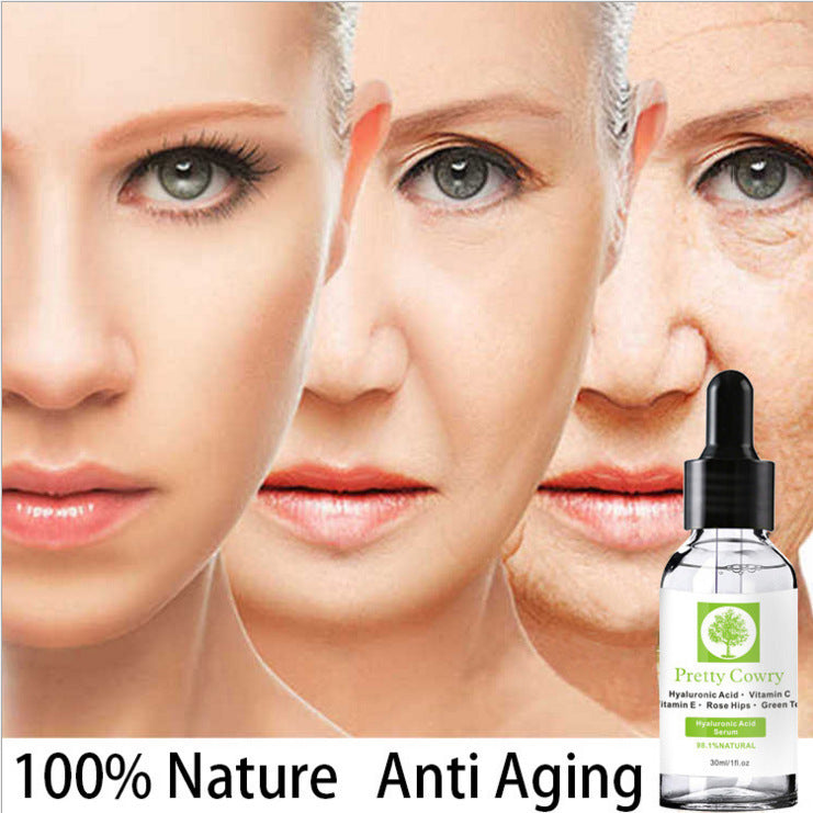 Pretty Cowry Vitamin C Serum bottle with anti-aging effects, featuring a woman's face transitioning from aged to youthful skin.