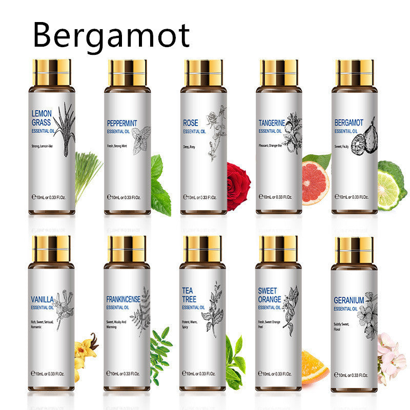 Assorted essential oils including bergamot, lemon grass, peppermint, rose, tangerine, and tea tree in amber glass bottles.