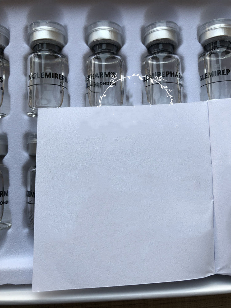 Vials of hyaluronic acid stock solution for moisturizing and hydrating skin, part of an essence product series with chamomile ingredient.