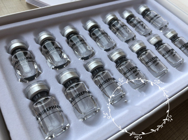 Box of hyaluronic acid stock solution vials for moisturizing and hydrating skin, suitable for all types, chamomile-infused essence.