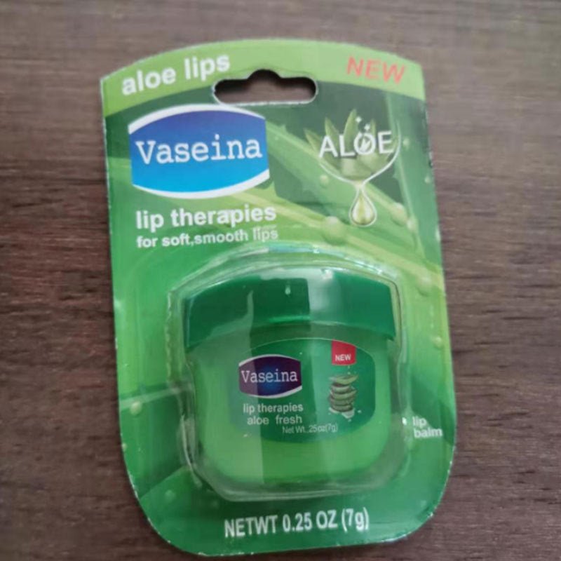 Aloe lip balm by Vaseina for soft, smooth lips in green packaging with aloe imagery, 0.25 oz.