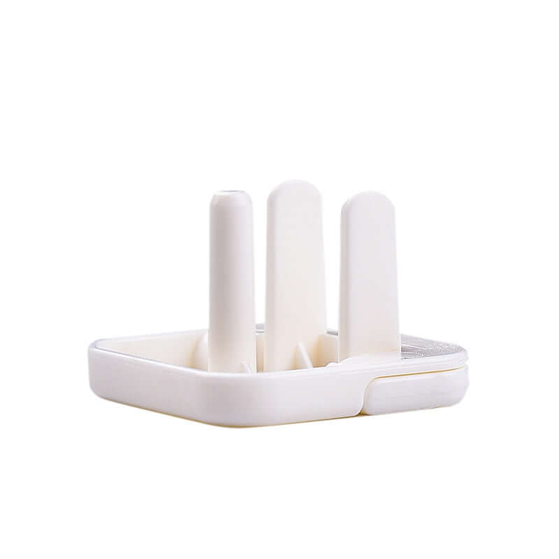 Child safety socket cover made of ABS resin, designed to protect children from electrical accidents, with two-phase and three-phase insulation.