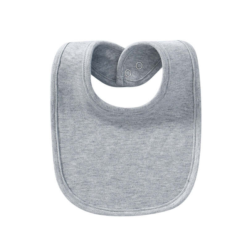 "Baby cotton bib with hidden buckle, available in solid colors and multiple options, designed to keep baby’s clothes clean and comfortable."