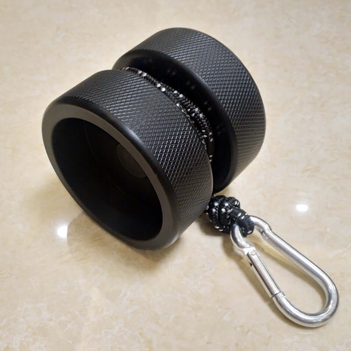 Close-up of ergonomic grips on weight-bearing wrist exercise equipment for improved hand strength”