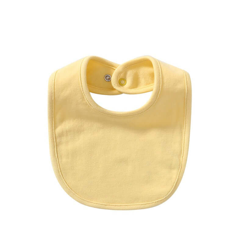 "Baby cotton bib with hidden buckle, available in solid colors and multiple options, designed to keep baby’s clothes clean and comfortable."