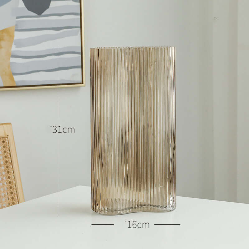 Hydroponic flowers in a transparent glass vase for elegant living room desktop decoration"