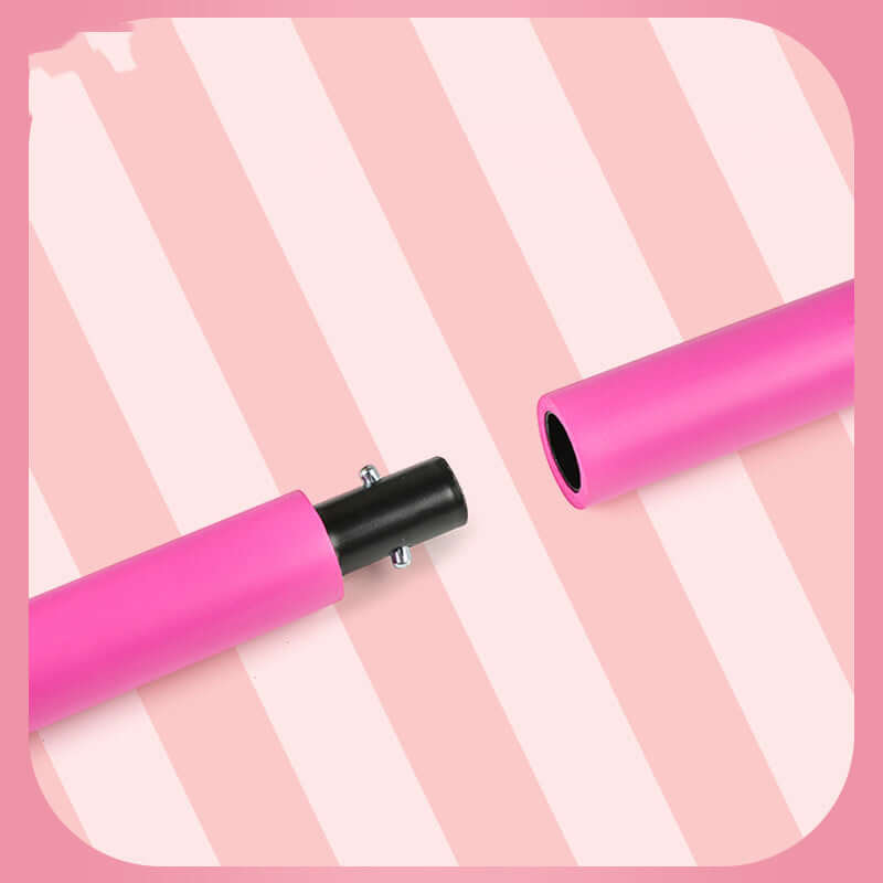 Pink Pilates fitness bar equipment with elastic exercise training setup featuring connection detail on striped background.