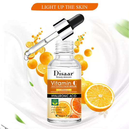 Vitamin C Hyaluronic Acid Face Serum bottle with dropper, featuring citrus elements for brightening and moisturizing skincare.