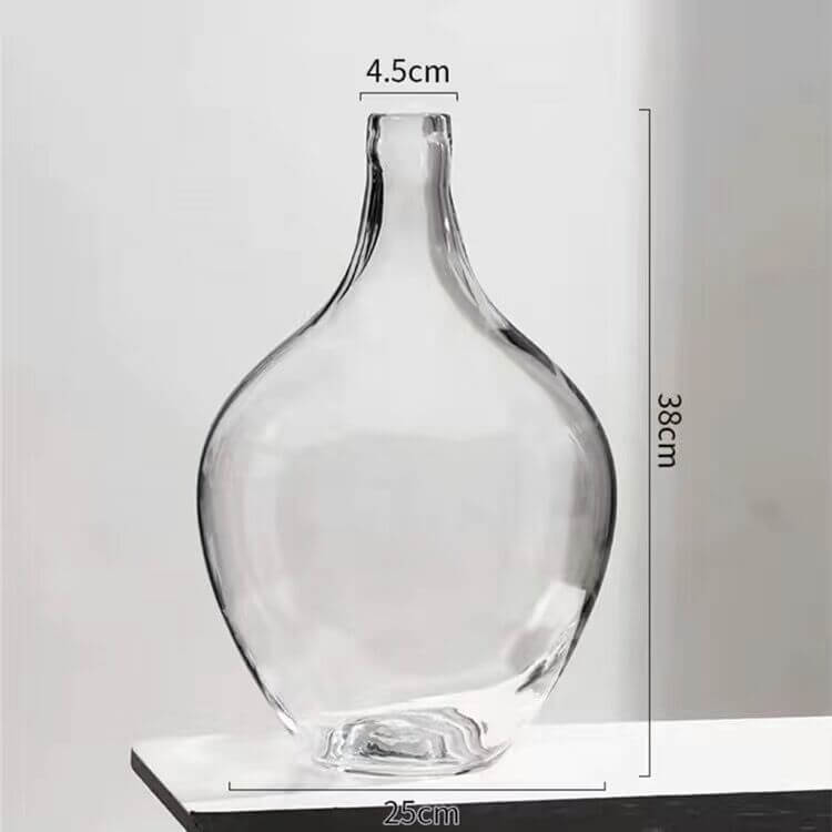 Big glass vase with dried flowers in Nordic Ins style for living room decor"
