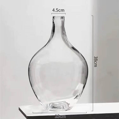 Big glass vase with dried flowers in Nordic Ins style for living room decor"