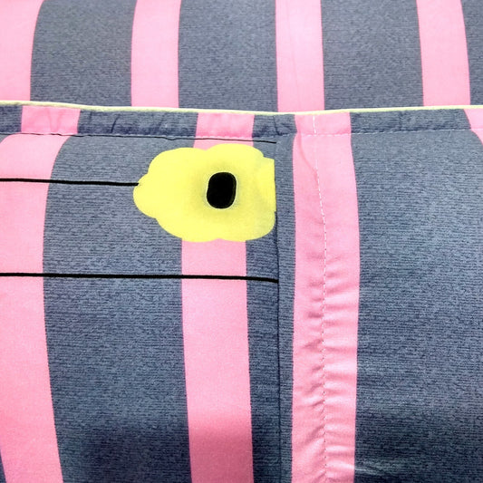 Blue and pink striped pillowcase with a yellow flower design made from ecological cotton and polyester fiber fabric.