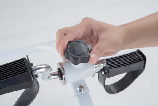 "Portable pedal exerciser and mini bicycle for leg fitness; foldable design for convenient indoor use, ideal as a compact treadmill stepper for versatile workouts. Model HW086."