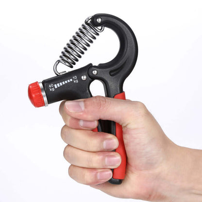 Person using adjustable hand grip strengthener for home exercise, featuring a sturdy design and 10kg - 40kg tension range.