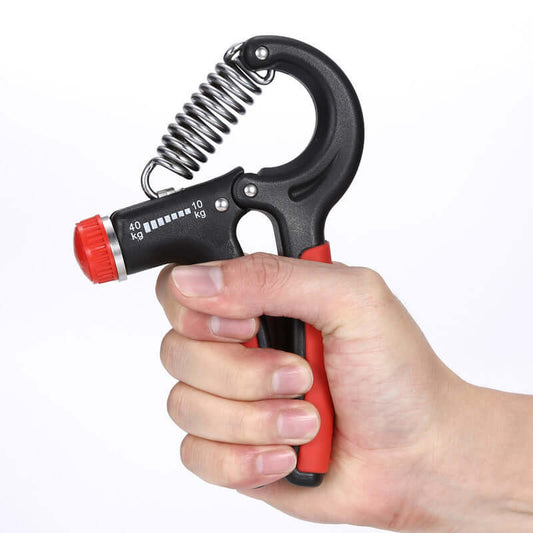 Person using adjustable hand grip strengthener for home exercise, featuring a sturdy design and 10kg - 40kg tension range.