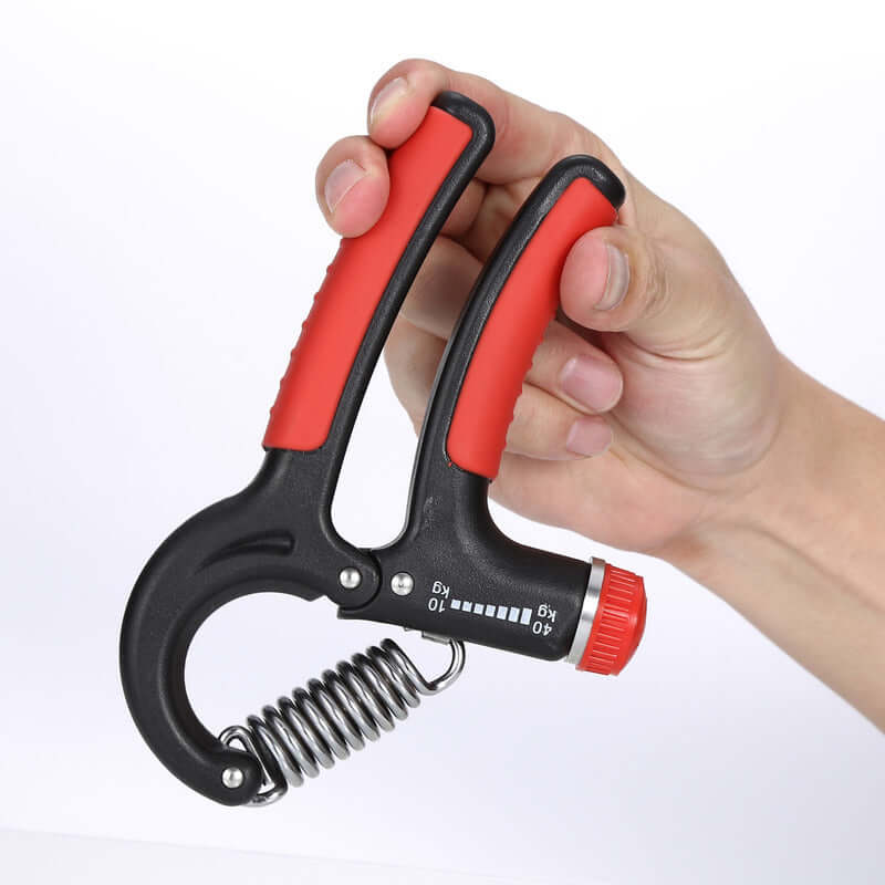 Person adjusting Men's Grip Professional Fitness Equipment with 10kg to 40kg adjustable range for hand, wrist, and forearm exercise