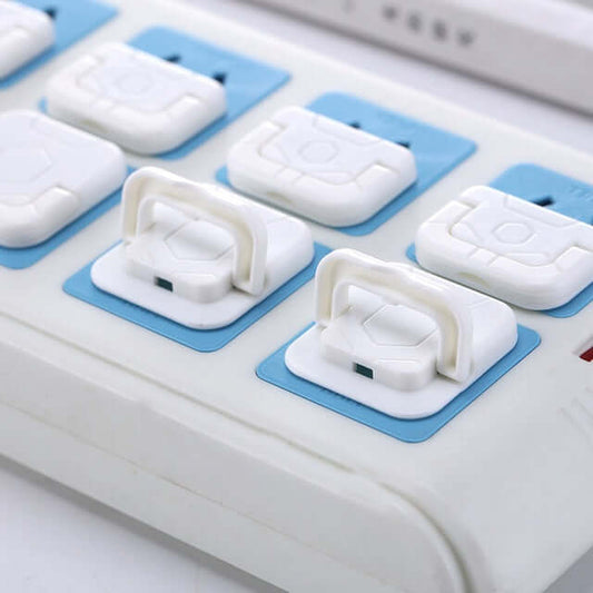 Child safety socket covers made of ABS resin, shown on a power strip, ensuring child protection and accident prevention.
