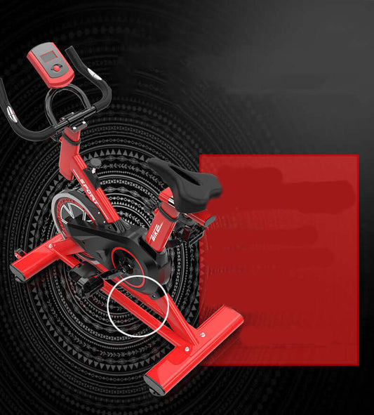 New red upright sports bike exercise equipment with adjustable seat and armrest, featuring flywheel and quiet belt design.
