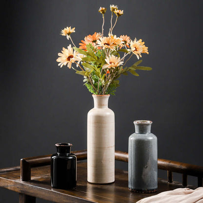 Home decoration vase with garden flowers inserted for a charming interior accent"