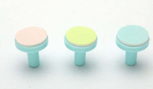 Replacement heads for electric baby nail sharpener in pastel colors.
