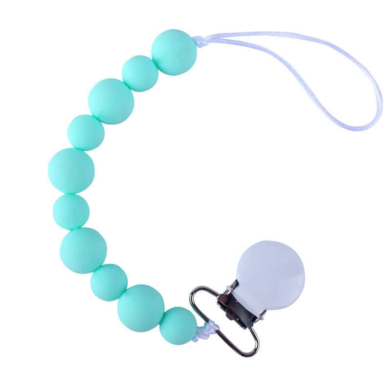 Mint green silicone pacifier clip chain for babies over 3 months, designed to prevent pacifier loss and keep it clean.