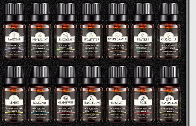 Assorted essential oils including lavender, peppermint, tea tree, and more in brown bottles, ideal for aromatherapy and skincare.