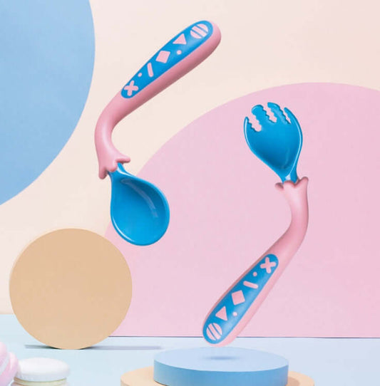 Pink and blue curved fork and spoon set for babies over 3 months, made from PP+TPE+304 stainless steel, designed to aid in learning to eat.