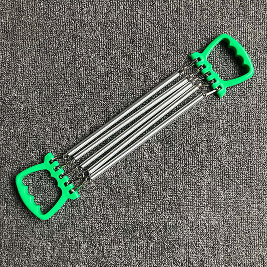 Chest expander training exercise equipment with carbon springs and green ABS plastic handles on grey background.