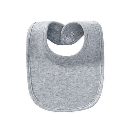 "Baby cotton bib with hidden buckle, available in solid colors and multiple options, designed to keep baby’s clothes clean and comfortable."