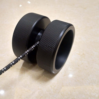 Close-up of ergonomic grips on weight-bearing wrist exercise equipment for improved hand strength”