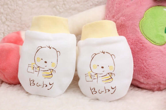 "Cartoon anti-scratch face gloves for babies, designed to protect delicate skin from scratches while adding a playful touch."