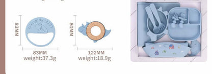 Silicone baby tableware set including mat, plate, fork, knife, and bowl in light blue color with product dimensions and weights displayed.