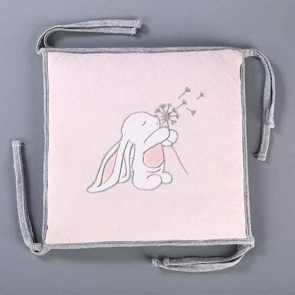 Knitted crib bed fence with embroidered bunny design, part of a 5-piece baby product set for cribs.