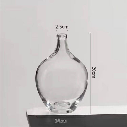 Big glass vase with dried flowers in Nordic Ins style for living room decor"