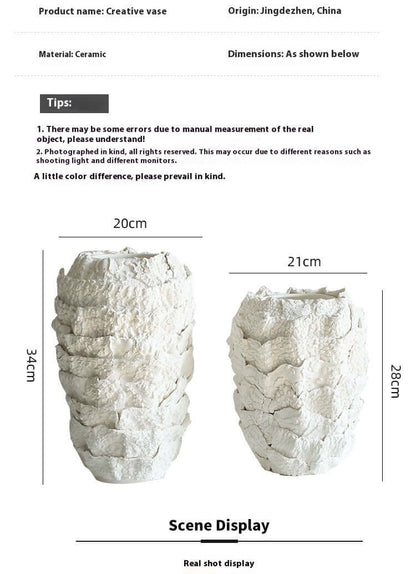 Creative white ceramic vase for modern dining table decoration, ideal for dried flowers and floral arrangements”